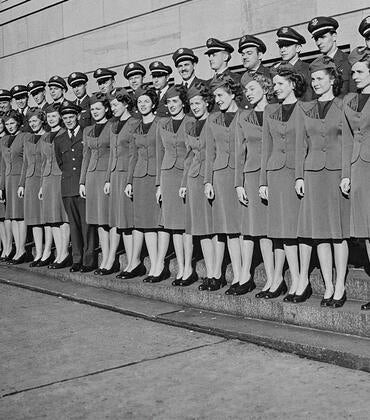 TWA flight attendants posing for a photograph after graduating from a training course at the TWA (Trans World Airlines) headquarters in Kansas City, Missouri, circa May 1946.