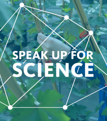 Header graphic with the Speak Up For Science logo overlayed on an image of a researcher