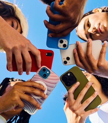 Teens on cellphone accessing social media