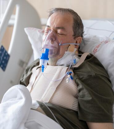 Man using a ventilator in a hospital