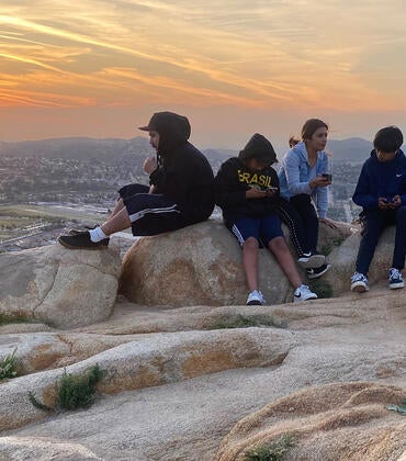 Inland Empire residents watch the sunset from the top of Mt. Rubidoux in Riverside