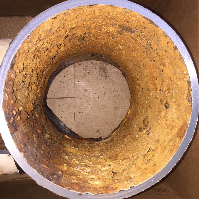 The rusted interior of a water pipe