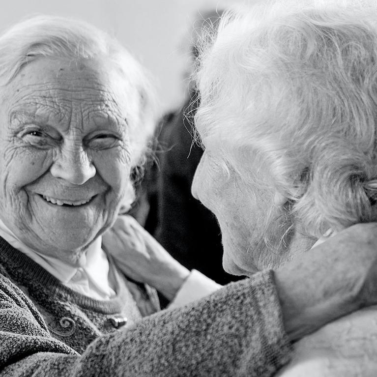 Two happy elderly women 