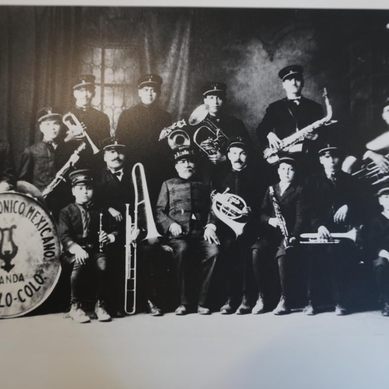 Black and white photo of the "Club Filarmónico Mexicano-Pueblo Colo." band. This photo is courtesy of the “Soundscapes of the People: A Musical Ethnography of Pueblo, Colorado” research. 