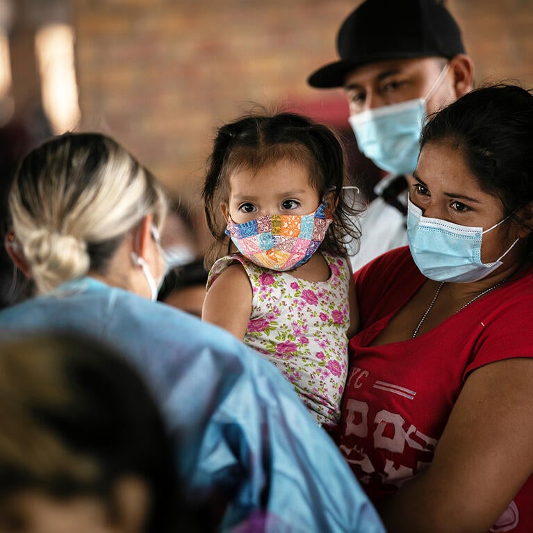 An immigrant family sees a nurse in Brownsville, Texas.