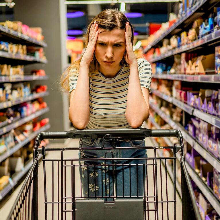 Stock photo of a stressed shopper