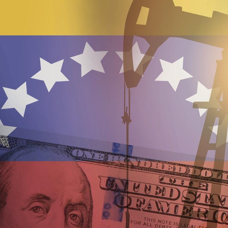 superimposed composite image of pump jack, 100-dollar bill, and Venezuelan flag
