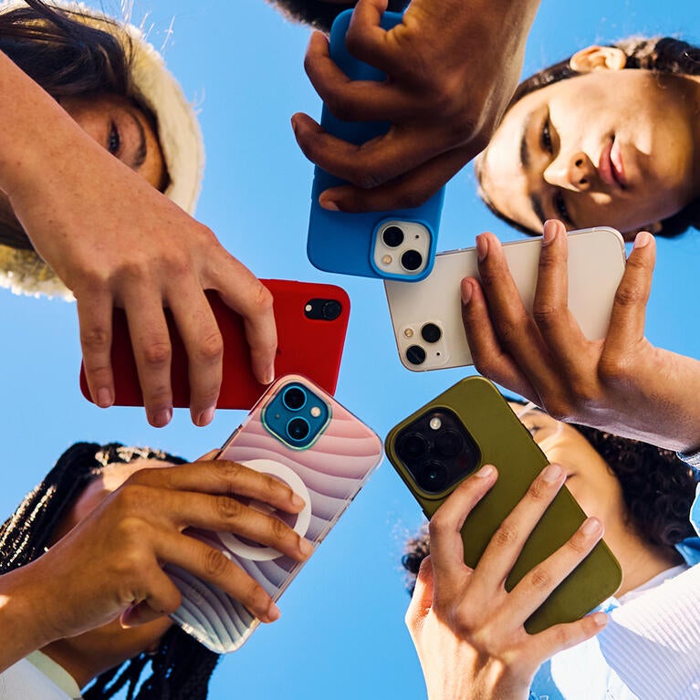 Teens on cellphone accessing social media