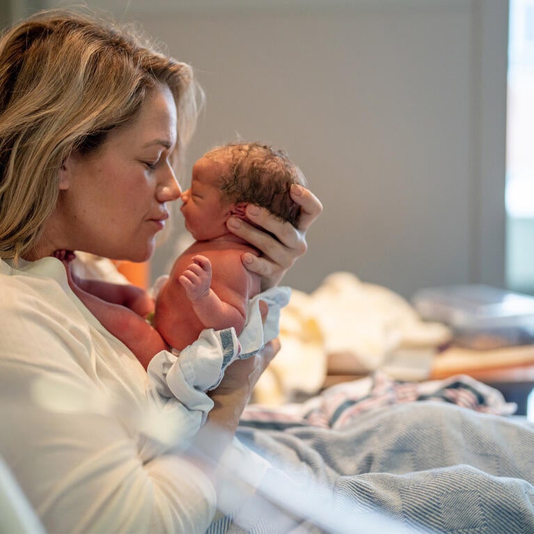 Mother with newborn baby in hospital