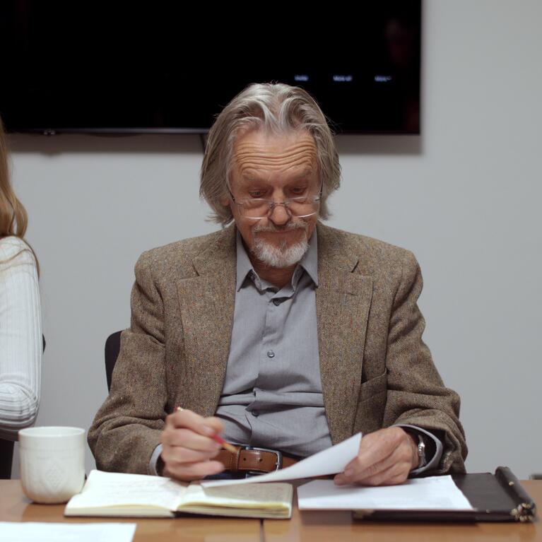 A scene from "The Cuts" showing actors Rachel Millar and Miles Anderson.