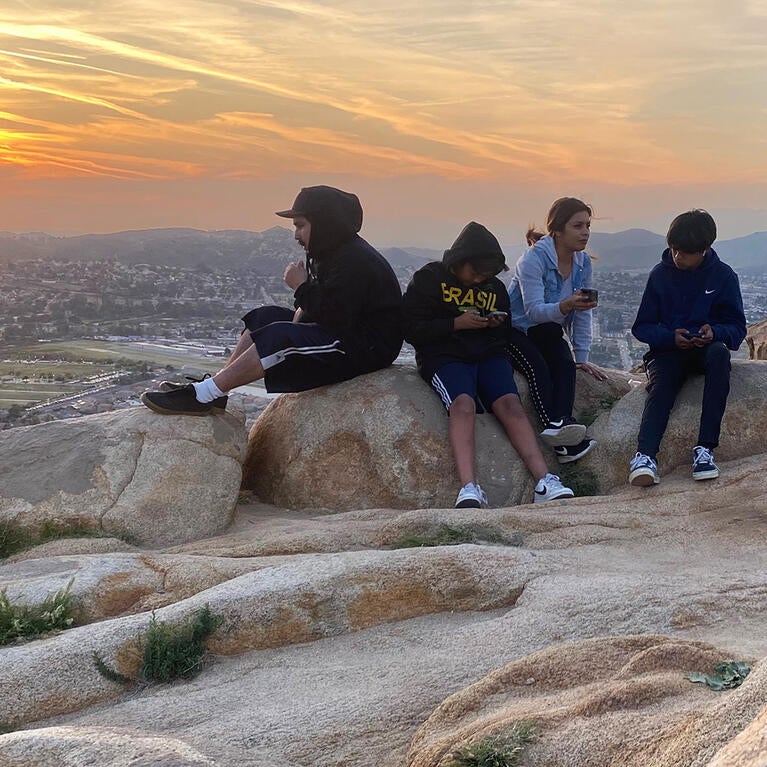 Inland Empire residents watch the sunset from the top of Mt. Rubidoux in Riverside