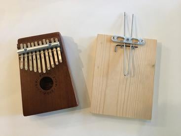 mbira musical instrument next to a density sensor based on it
