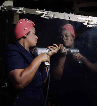 A woman constructing a Vulteeultee A-31 Vengeance dive bomber airplane in Tennessee in during World War II.