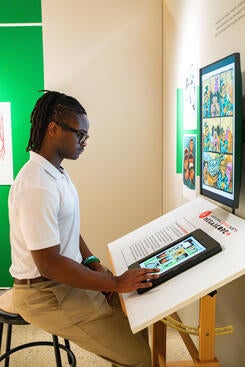 Visitor looks at Jennings exhibit