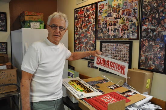 Richard Munio with Sub Station sign