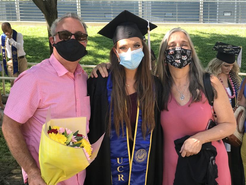 Emmanuelle Aruta, 23, with her parents, Gayle and Daniel Aruta, on Monday, June 14, 2021. (UCR/Sandra Baltazar Martínez)