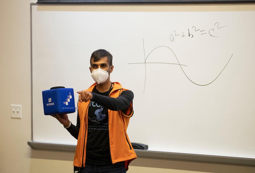 Mohammad “Siddiq” Siddiqui-Ali, Multimedia Technology Analyst for ITS, gives a demonstration with a Catchbox, a Nerf-like cube with an enclosed microphone that can be tossed, on Friday, September 17, 2021, at UC Riverside. The program, called Rooms for Increasing Student Engagement, or RISE, will feature classrooms that allow for both in-person and remote options for the same class. (UCR/Stan Lim)