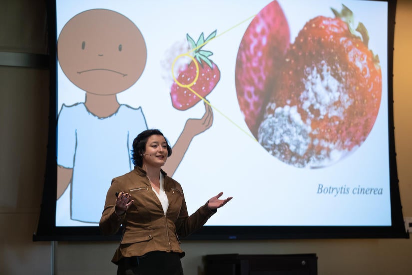 Claire Whitaker presents, "Finishing off Food Fungus for Good," during the Grad Slam competition on Thursday, March 3, 2022, at the Alumni and Visitor Center at UC Riverside. (UCR/Stan Lim)
