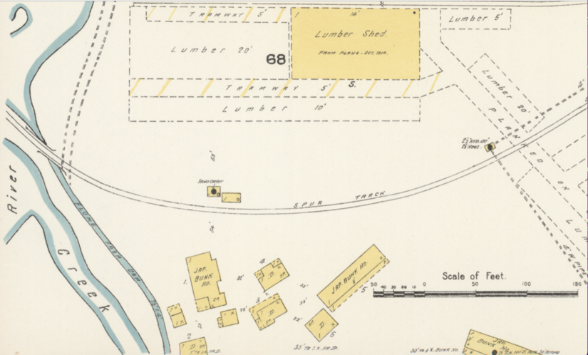 Close-up of the Eatonville "Jap Camp." The map shows the marginalization of the Japanese laborers, who lived in a cluster of buildings encircled by a railroad track, creek, and dam flume. Sanborn Fire Insurance Map from Eatonville, Pierce County, Washington, 1914. (Image courtesy of Megan Asaka)