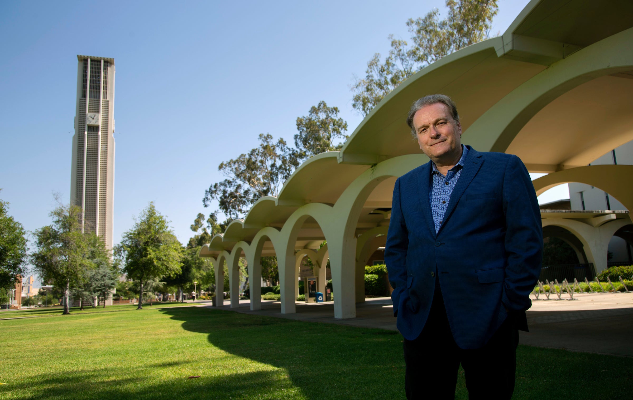 RE_library Richard Edwards, director of XCITE, stands in front of Rivera Library at UCR