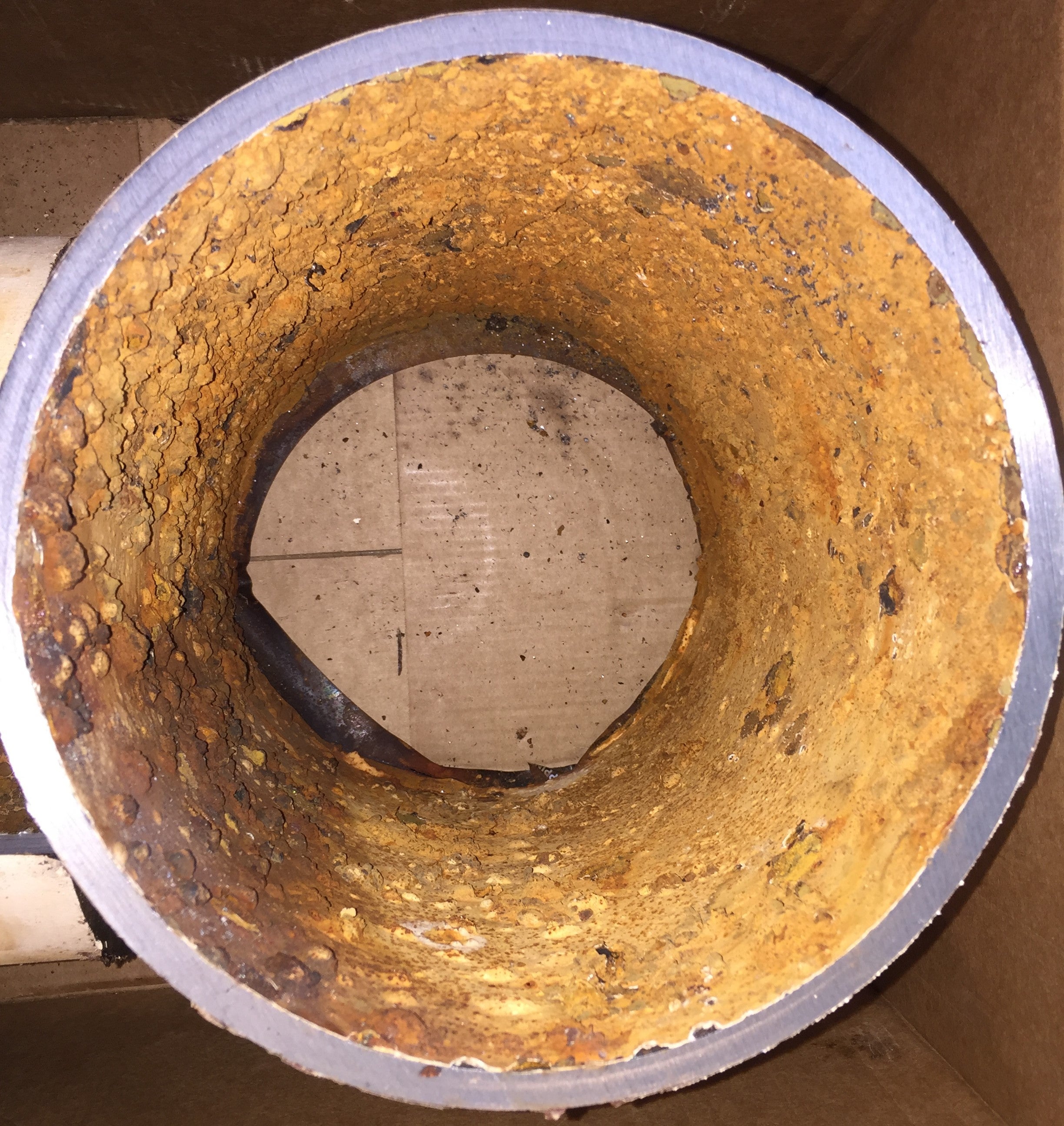 The rusted interior of this water pipe contains chromium that reacts with residual water disinfectants to form carcinogenic hexavalent chromium. (Water Chemistry and Technology Lab/UCR)