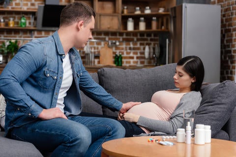 pregnant on couch pregnant woman on couch