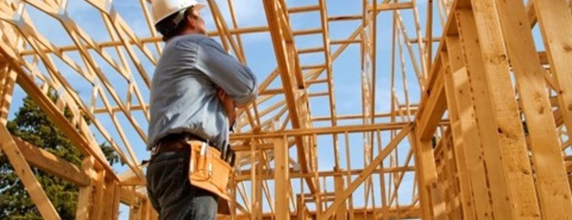 A photo of a house being built.