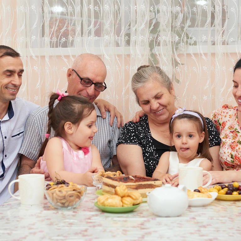 Extended family having tea