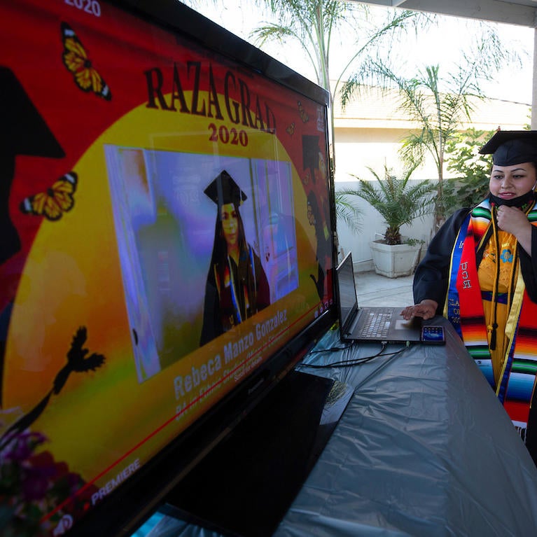 Jacqueline Hernandez Rico, 33, sets up for her family to watch the virtual Raza Grad ceremony on June 13, 2020 in Perris. (UCR/Stan Lim)