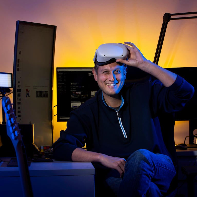Assistant Professor Ilya Brookwell sits in the new MCS Livestreaming and VR Lab